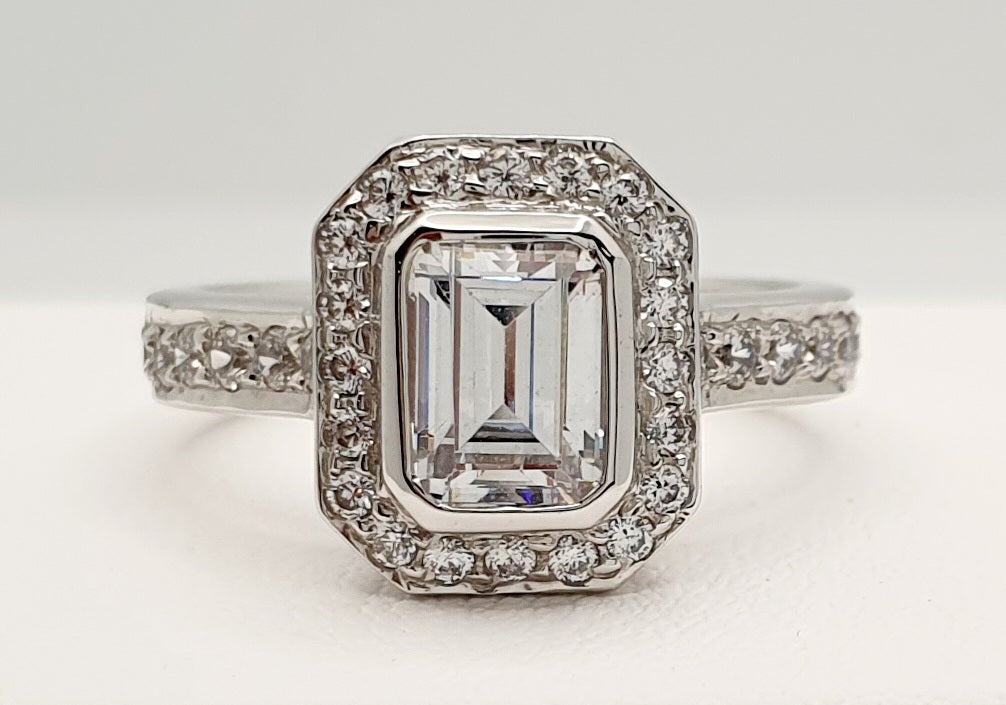 9ct White Gold Cubic Zirconia Ring With Emerald Cut Centre Stone