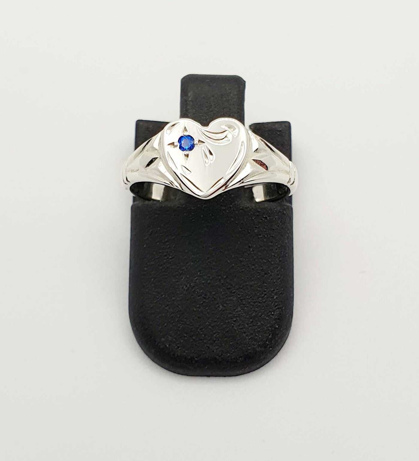 S/S Heart Signet Ring with Blue Stone. Size F