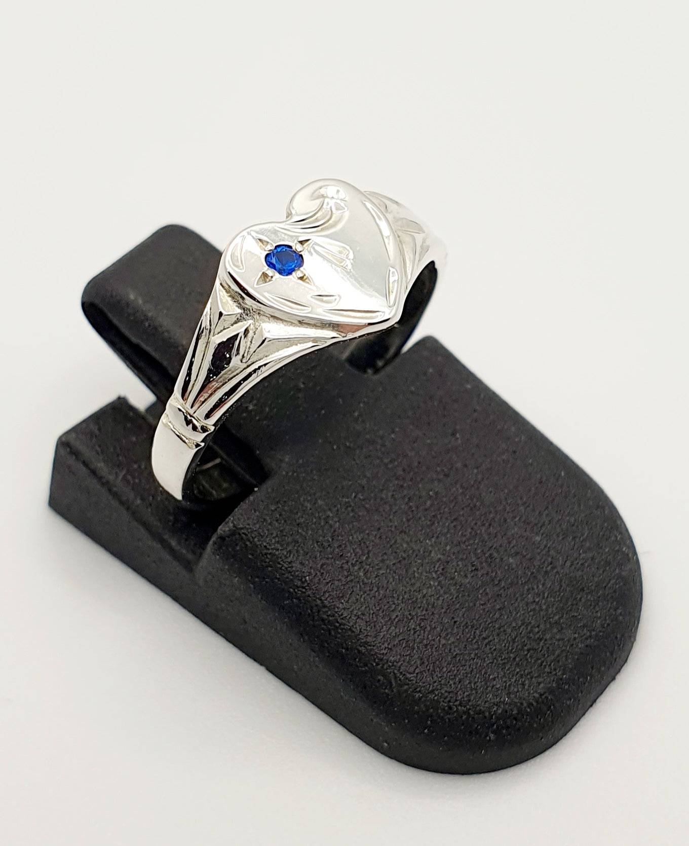 S/S Heart Signet Ring with Blue Stone. Size F
