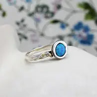 Handmade Sterling silver set with a large stunning Blue Opal Ring size O