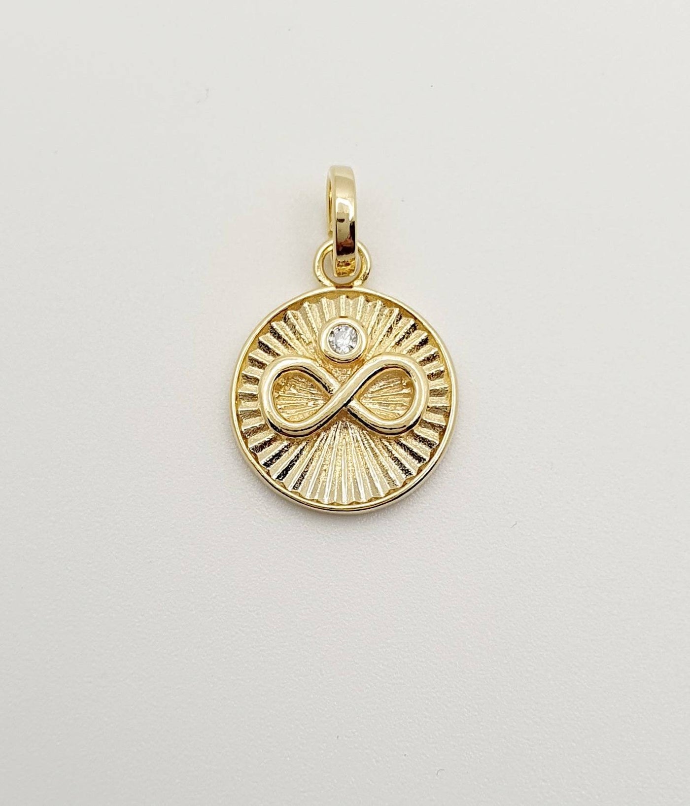 18K Gold, Filled, Infinity Pendant With Spokes From Center To Edges & Single CZ