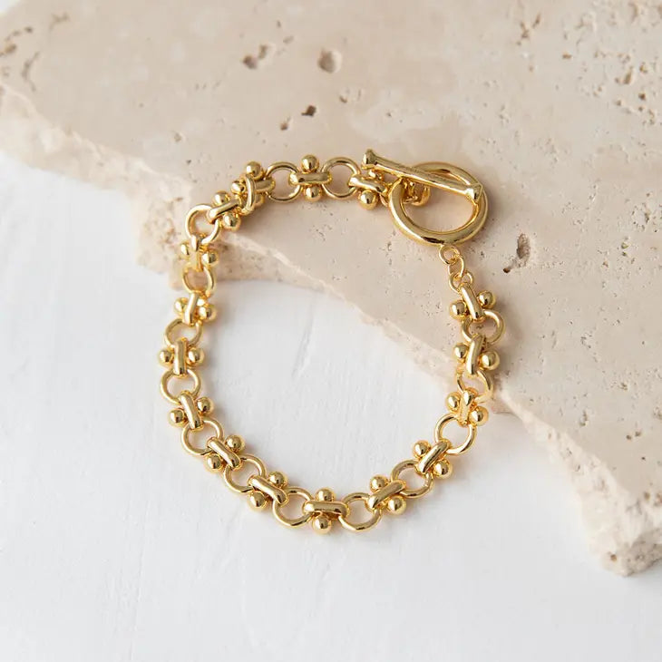 The Jett Bracelet Crafted from recycled brass with a thick 18k gold plating. Tarnish free.