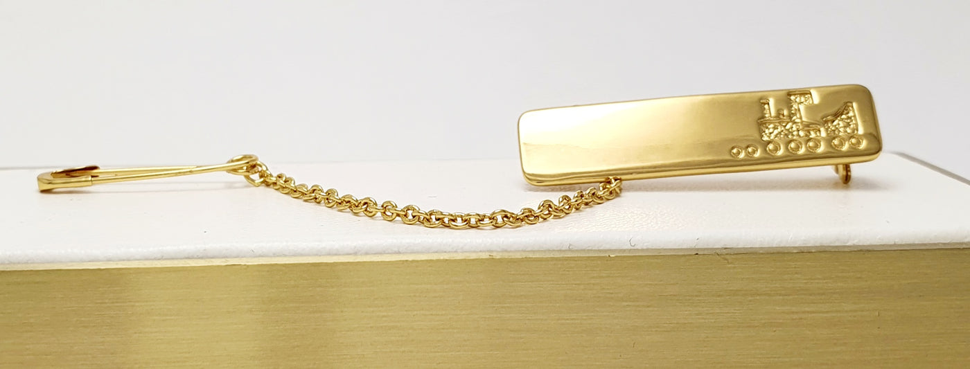 Gold Plated Sterling Silver Baby Brooch With Embossed Train
