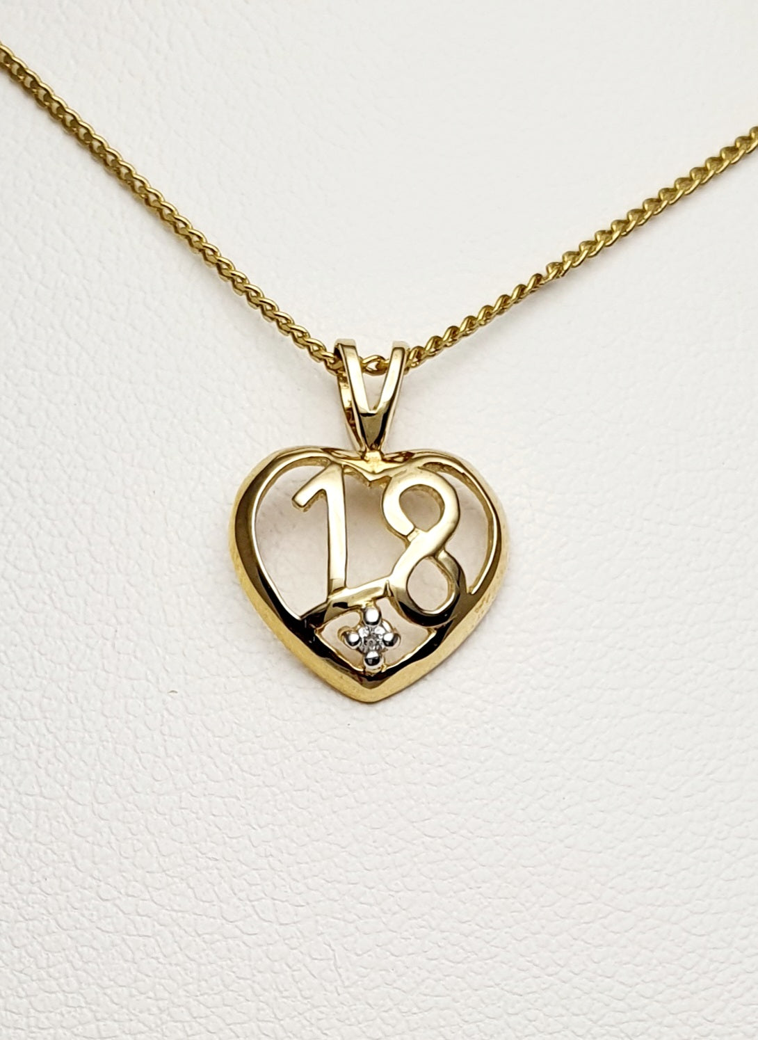 9ct Yellow Gold "18" Heart Pendant set with a Diamond