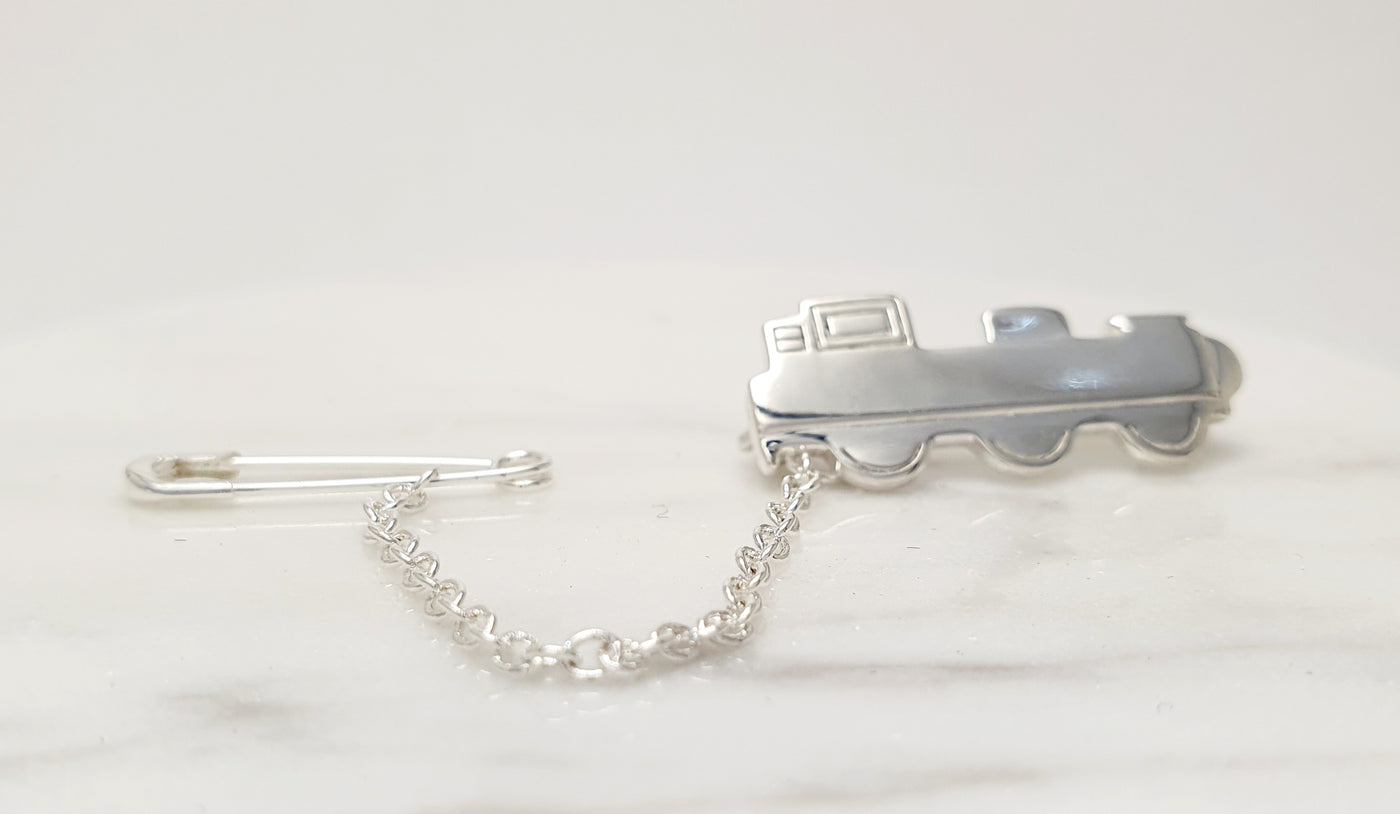 STERLING SILVER TRAIN SHAPED BABY BROOCH